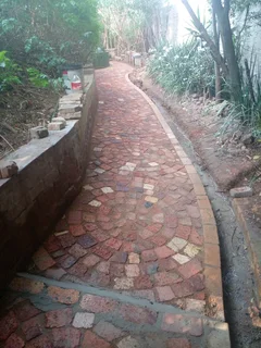 Cobble half brick paving  and tar surfacing