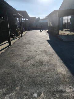 Tar surfacing and brick paving