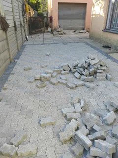 Brick paving and tar surfacing
