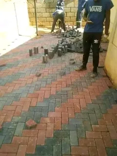 Brick paving and tar surfacing