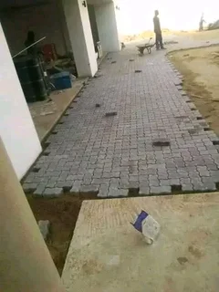 Brick paving and tar surfacing