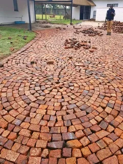 Cobble half brick paving and tar surfacing