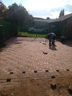 Brick paving and tar surfacing