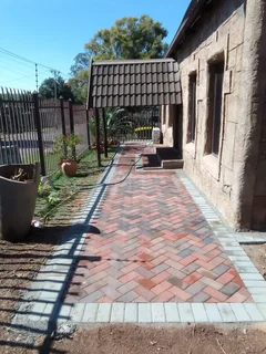 Brick paving and tar surfacing