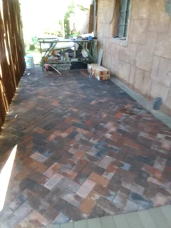 Brick paving and tar surfacing