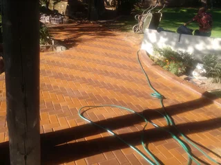 Brick paving and tar surfacing