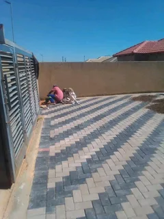 Brick paving and tar surfacing