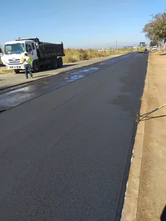 tar surfacing and tennis courts