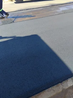 tar surfacing and tennis courts