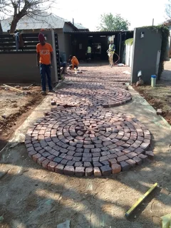Brick paving and cobble half brick paving