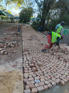 Brick paving and cobble half brick paving
