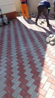 Brick paving and cobble half brick paving