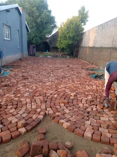 Brick paving and cobble half brick paving