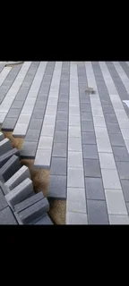 Brick paving and tar surfacing