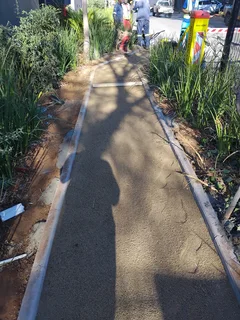 Brick paving and tar surfacing