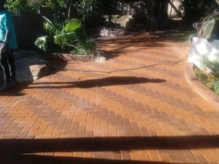 Brick paving and tar surfacing