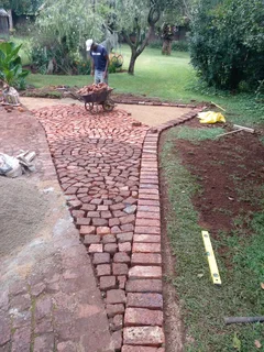 Cobble half brick paving and tar surfacing