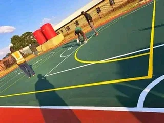 Tennis courts and tar surfacing