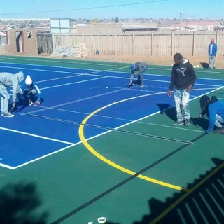 Tennis courts and tar surfacing