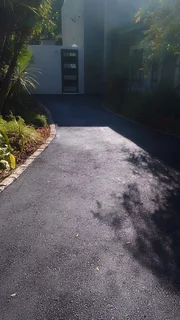 Tennis courts and tar surfacing