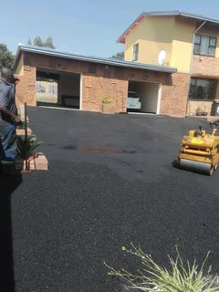 Tennis courts and tar surfacing