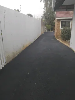 Tennis courts and tar surfacing