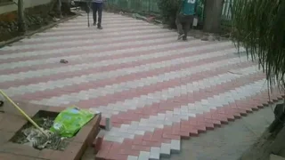 Brick paving and tar surfacing