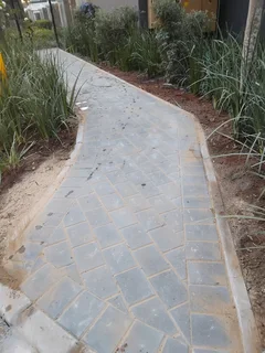 Brick paving and tar surfacing