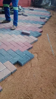 Brick paving and tar surfacing