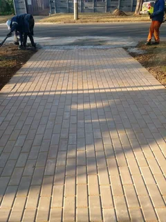 Brick paving and tar surfacing