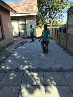 Brick paving and tar surfacing