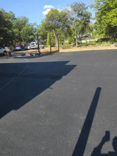 Cobble half brick paving and tar surfacing