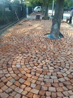 Cobble half brick paving and tar surfacing