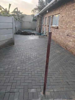 Brick paving and tar surfacing