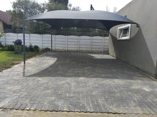 Brick paving and tar surfacing