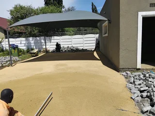 Brick paving and tar surfacing