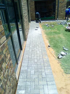 Brick paving and tar surfacing