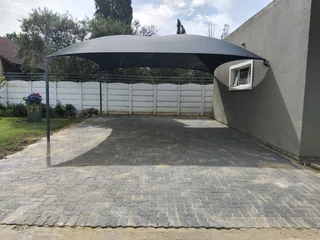 Brick paving and tar surfacing