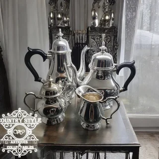 Elegant Silver Tea and Coffee Set