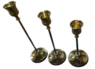 Set of three graduated brass taper candlesticks
