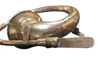 A collectible Cornet Simple (Circular Trumpet/Trombone), likely European (French) origin, dating to