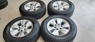 with 265/65/17 GT Radial AT3(90-95% life on them) set for R10500.