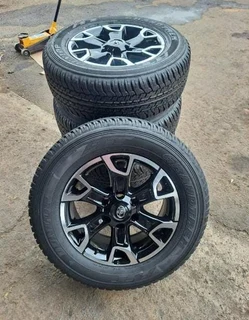 18inch Toyota Legend 50 original mags with brand new 265/60/18 Dunlop Grandtrek A/T set R17000.