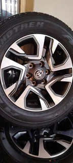 18inch Toyota Fortuner original mag with brand new 265/60/18 Dunlop  A/T to use for spare R4800