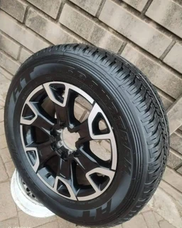 18inch Toyota Legend 50 OEM mag with brand new 265/60/18 Dunlop Grandtrek A/T to use for spare R4850