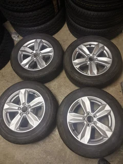 15inch Audi A1 original mags with 185 65 15 Bridgestone tyres 90% new, set R7500They also do fit on