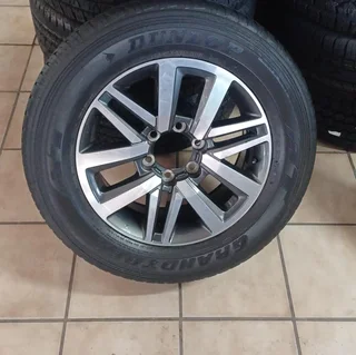 Toyota Hilux/Fortuner 18inch original mag with used 265/60/18 Dunlop  AT to use for spare R3500.