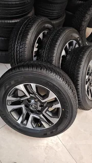 18inch Toyota Legend 55/Fortuner original mags with brand new 265/60/18 Dunlop  AT set for R17500