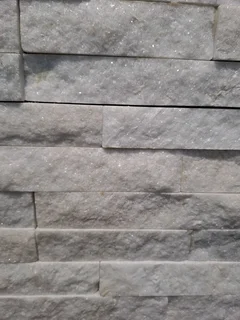Natural Stone Cladding(Statuario Interlock)