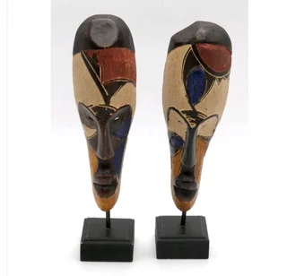 Two Mounted African Tribal Masks on wooden blocks